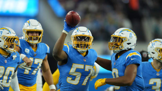 Linebackers Amen Ogbongbemiga comes up with a fumble against the Buffalo Bills.